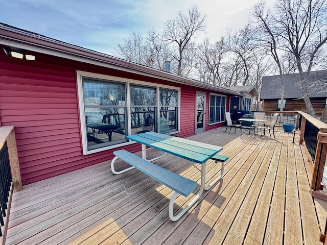 28887 Hi Vista Dr, Otter Tail Twp, MN 56515 - wooden terrace with outdoor dining area