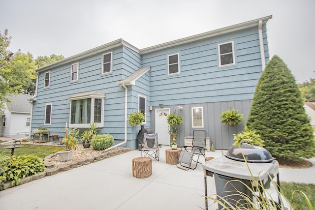 rear view of property with a patio area