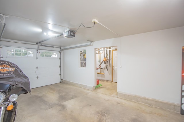 garage featuring a garage door opener