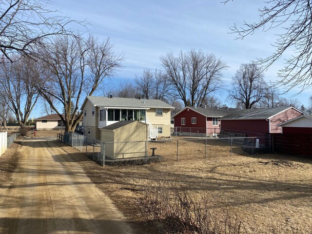 view of front of house with fence