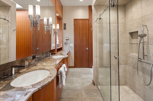 5123 Lake Ridge Rd, Edina, MN 55436 - bathroom featuring a stall shower, double vanity, and recessed lighting