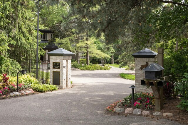 5123 Lake Ridge Rd, Edina, MN 55436 - view of asphalt road with view of scattered trees