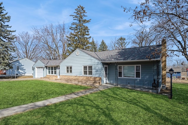 ranch-style home with a chimney, a front yard, a garage, and a shingled roof