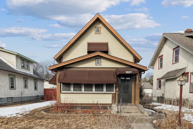 view of front of house with fence