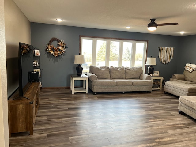 living room with ceiling fan, baseboards, dark wood-style floors, and recessed lighting