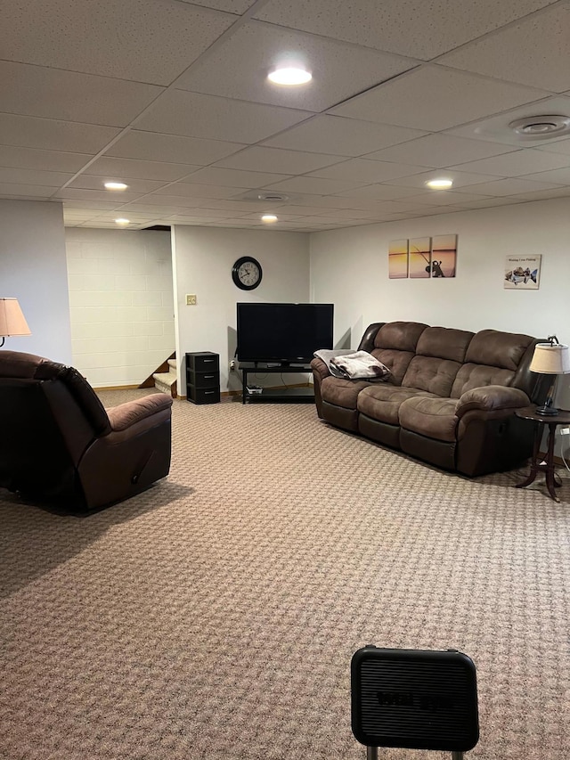 living room with visible vents, a drop ceiling, recessed lighting, stairway, and carpet flooring