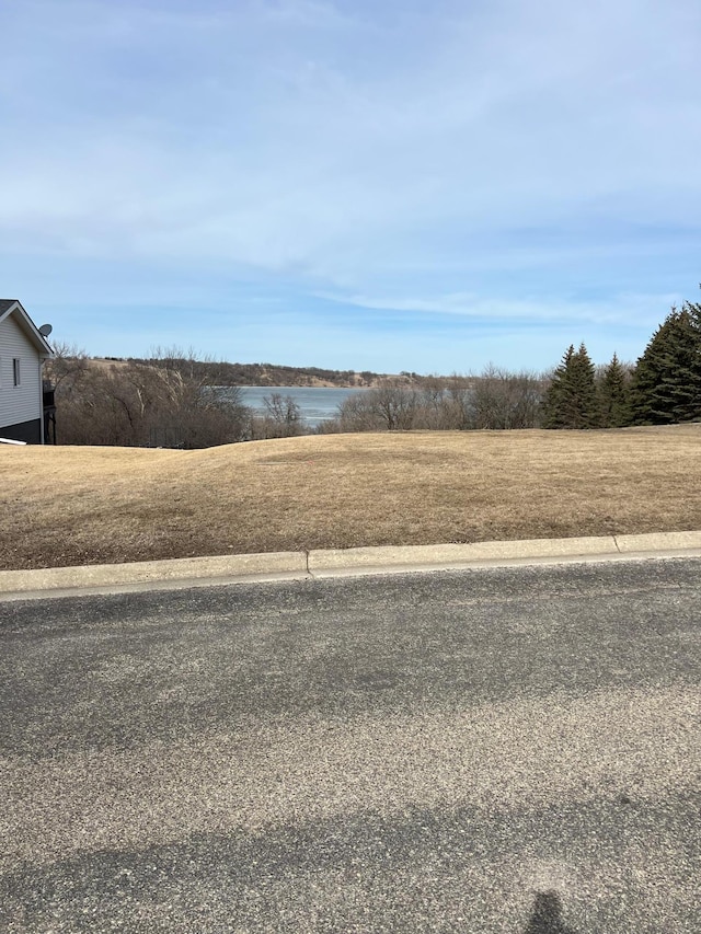 view of yard featuring a water view