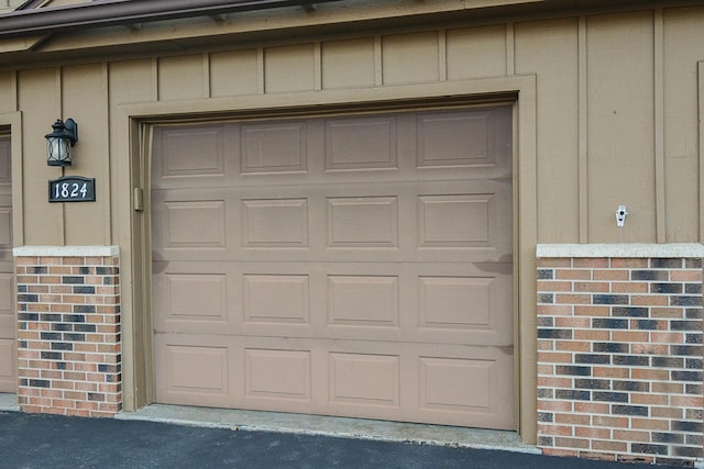 garage featuring driveway