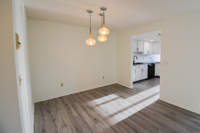 interior space featuring dark wood-type flooring and a sink