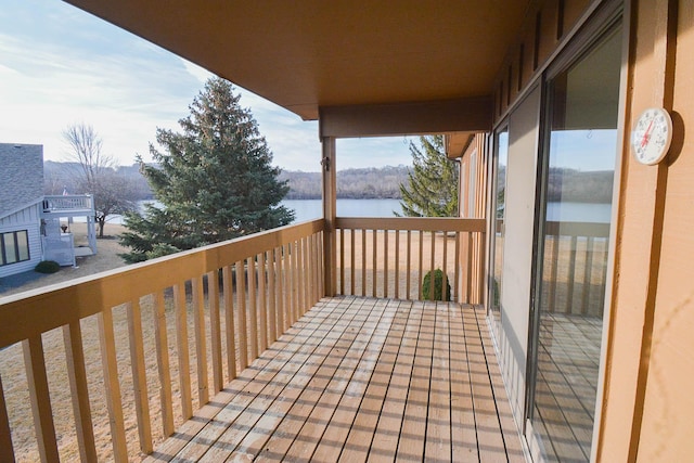 deck featuring a water view