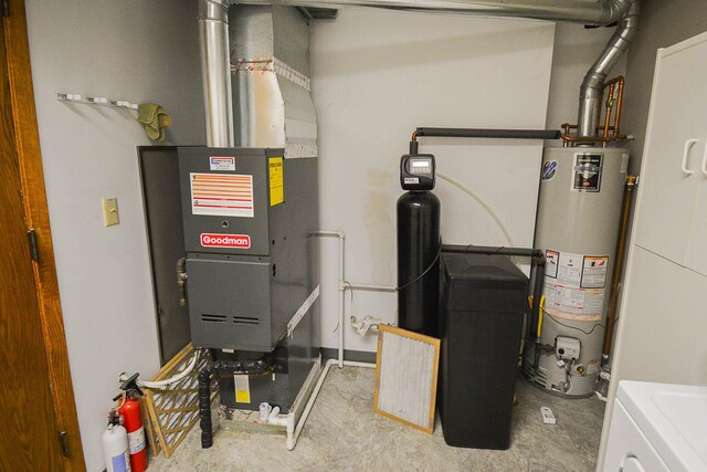 utilities with water heater and washer / dryer