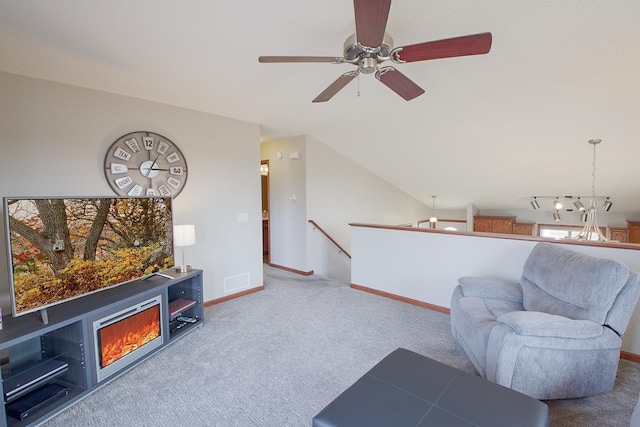 carpeted living room with visible vents and baseboards