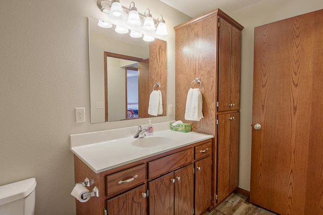 half bath with toilet and vanity