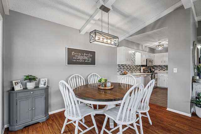 dining area featuring beam ceiling, dark wood-type flooring, and baseboards