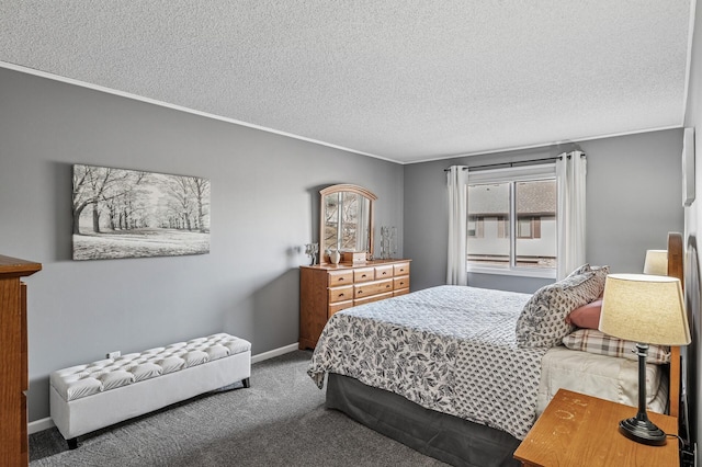 bedroom with baseboards, carpet floors, a textured ceiling, and crown molding