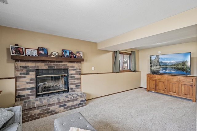 living area featuring a brick fireplace, light colored carpet, baseboards, and a textured ceiling