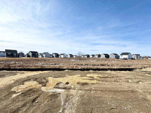 view of yard featuring a residential view