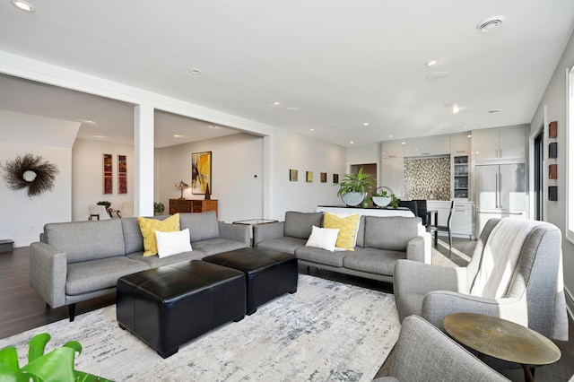 living room featuring recessed lighting and light wood-type flooring