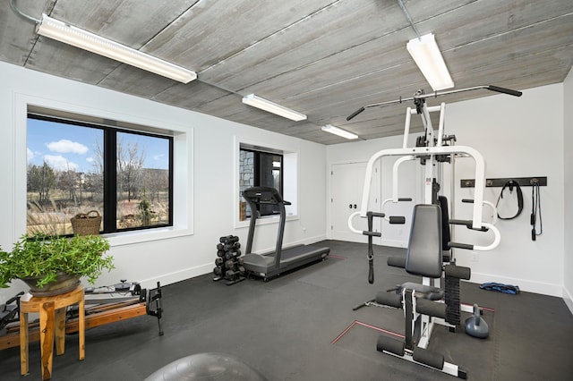 exercise room with baseboards