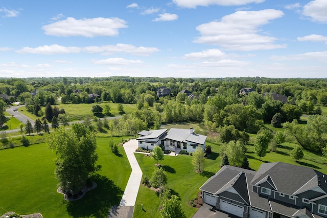 aerial view with a wooded view