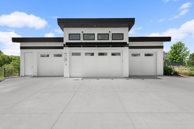 garage featuring driveway