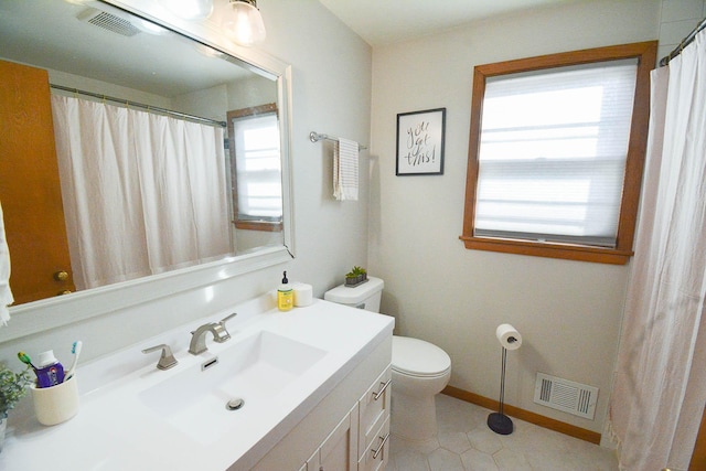 full bathroom with vanity, toilet, baseboards, and visible vents