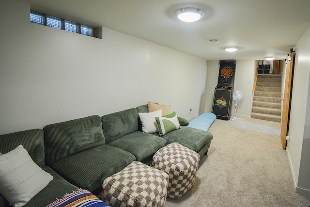 living area with stairs, carpet flooring, and baseboards