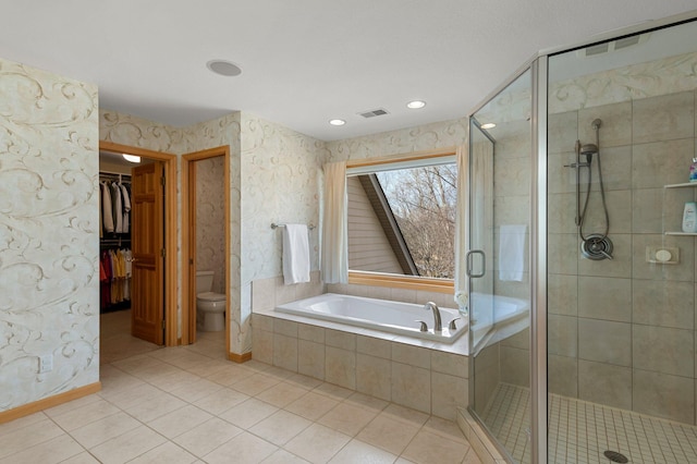 full bath with wallpapered walls, a shower stall, a bath, and visible vents