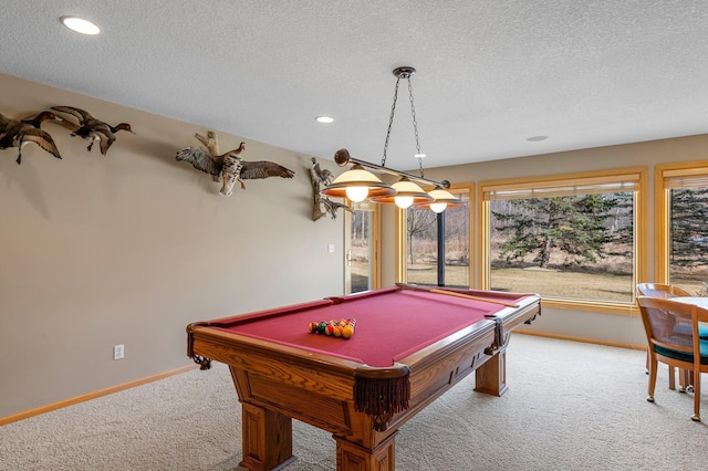 recreation room with carpet flooring, a textured ceiling, billiards, and baseboards