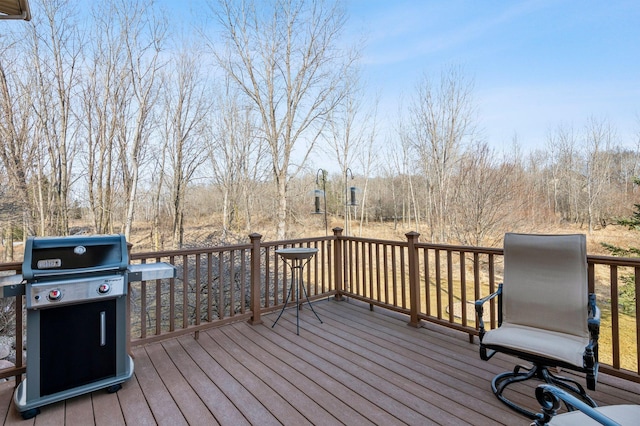 wooden deck with area for grilling