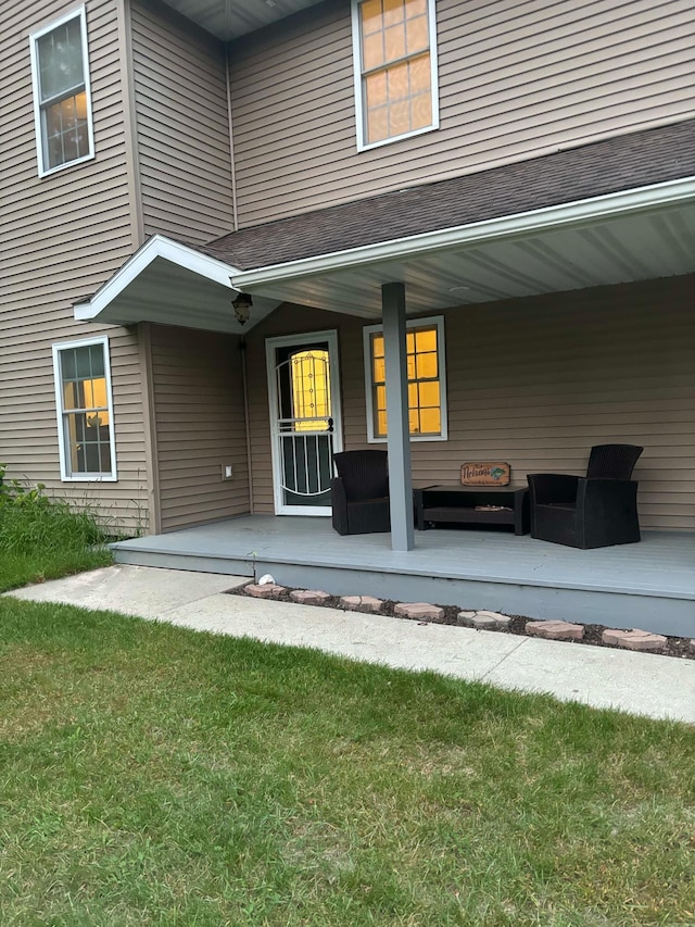 doorway to property with covered porch