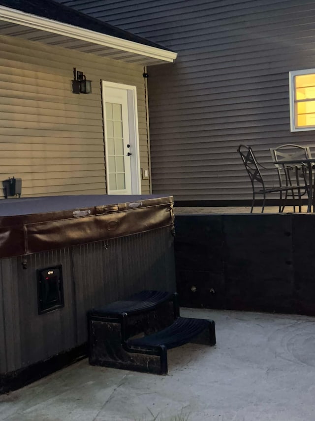 view of patio with a hot tub