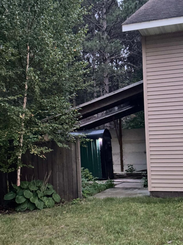 view of outdoor structure with fence