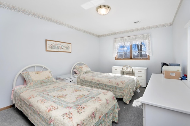 carpeted bedroom with baseboards