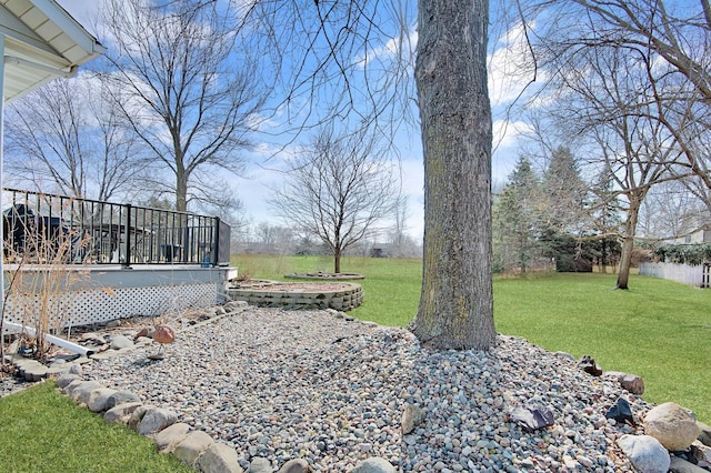 view of yard featuring a wooden deck