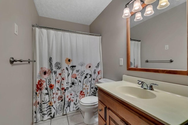 bathroom featuring toilet, curtained shower, a textured ceiling, tile patterned flooring, and vanity