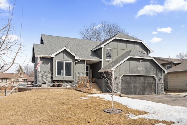 view of front of house featuring an attached garage, brick siding, driveway, and roof with shingles