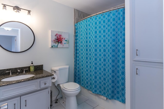 bathroom featuring curtained shower, toilet, and vanity