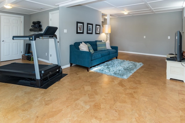 exercise room with baseboards