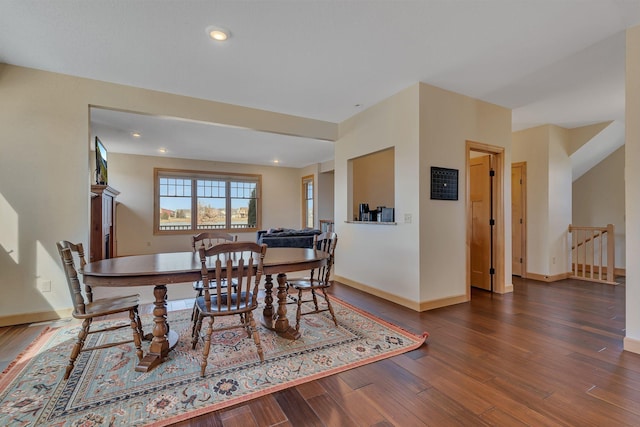 dining room featuring recessed lighting, wood finished floors, and baseboards