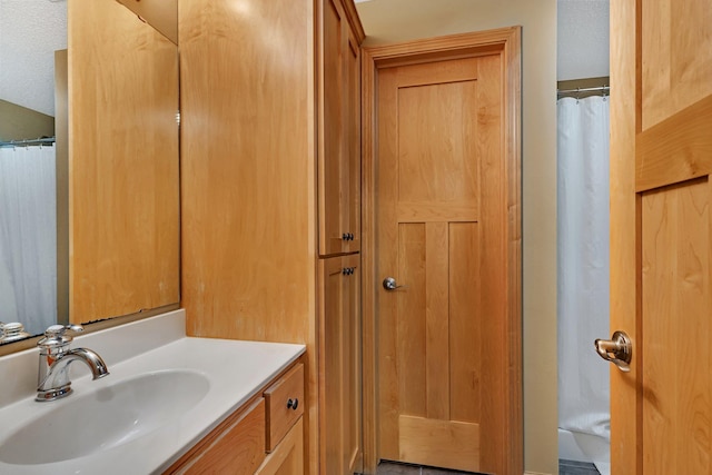 full bathroom featuring vanity