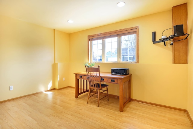 office space featuring light wood-style flooring, recessed lighting, and baseboards