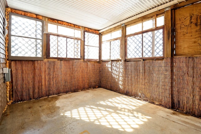 unfurnished sunroom featuring plenty of natural light