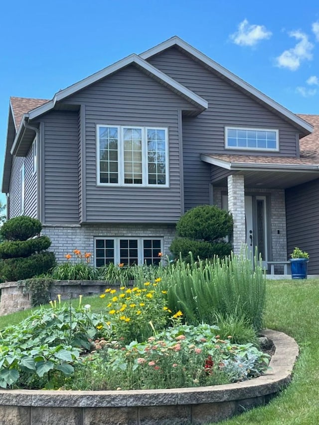 view of front of property with brick siding