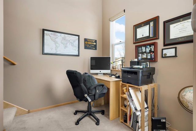 office featuring baseboards and carpet floors