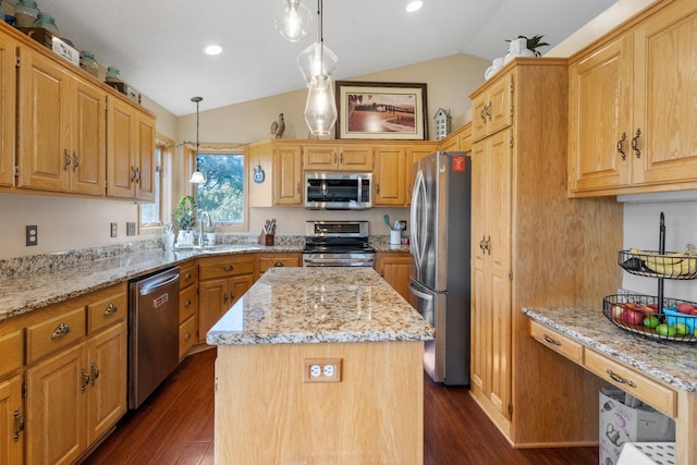 kitchen featuring dark wood-style floors, light stone countertops, stainless steel appliances, vaulted ceiling, and a center island