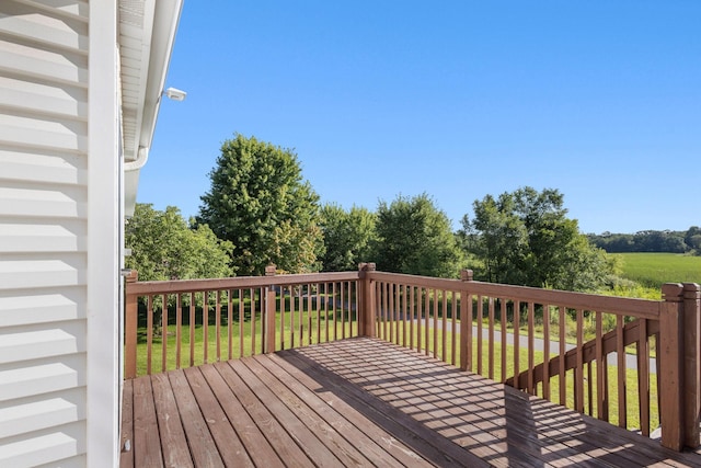 wooden deck with a yard