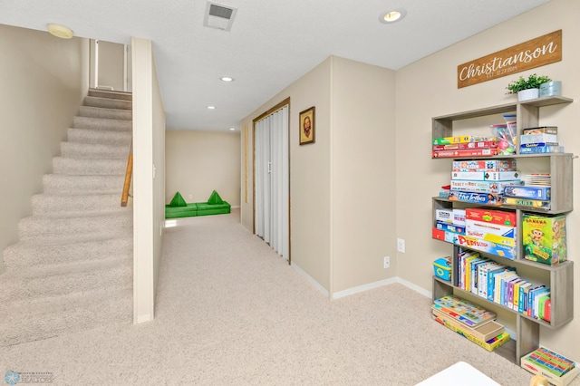 game room with recessed lighting, visible vents, baseboards, and carpet