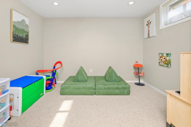 playroom with recessed lighting and baseboards