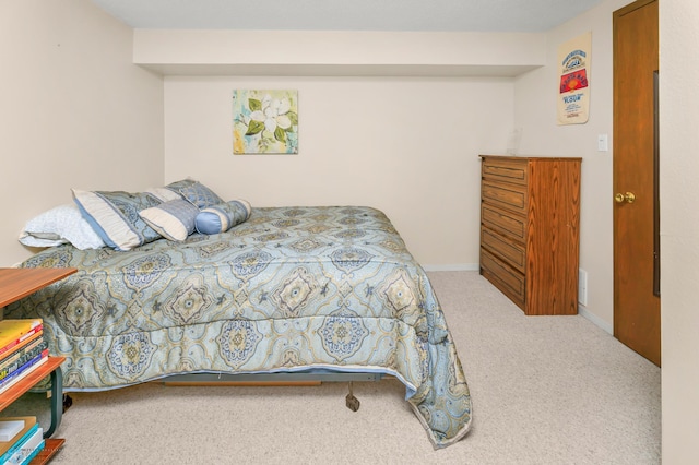 carpeted bedroom with baseboards